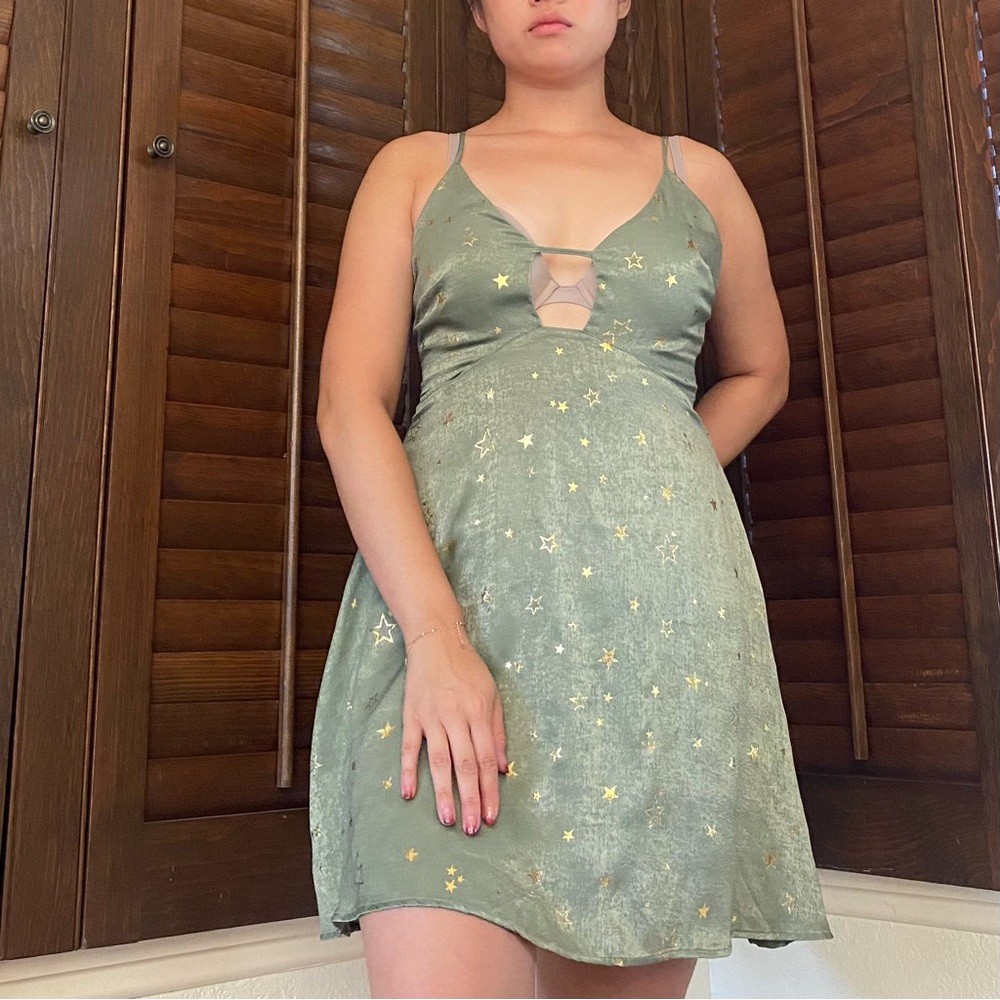 Green and gold star skater dress
